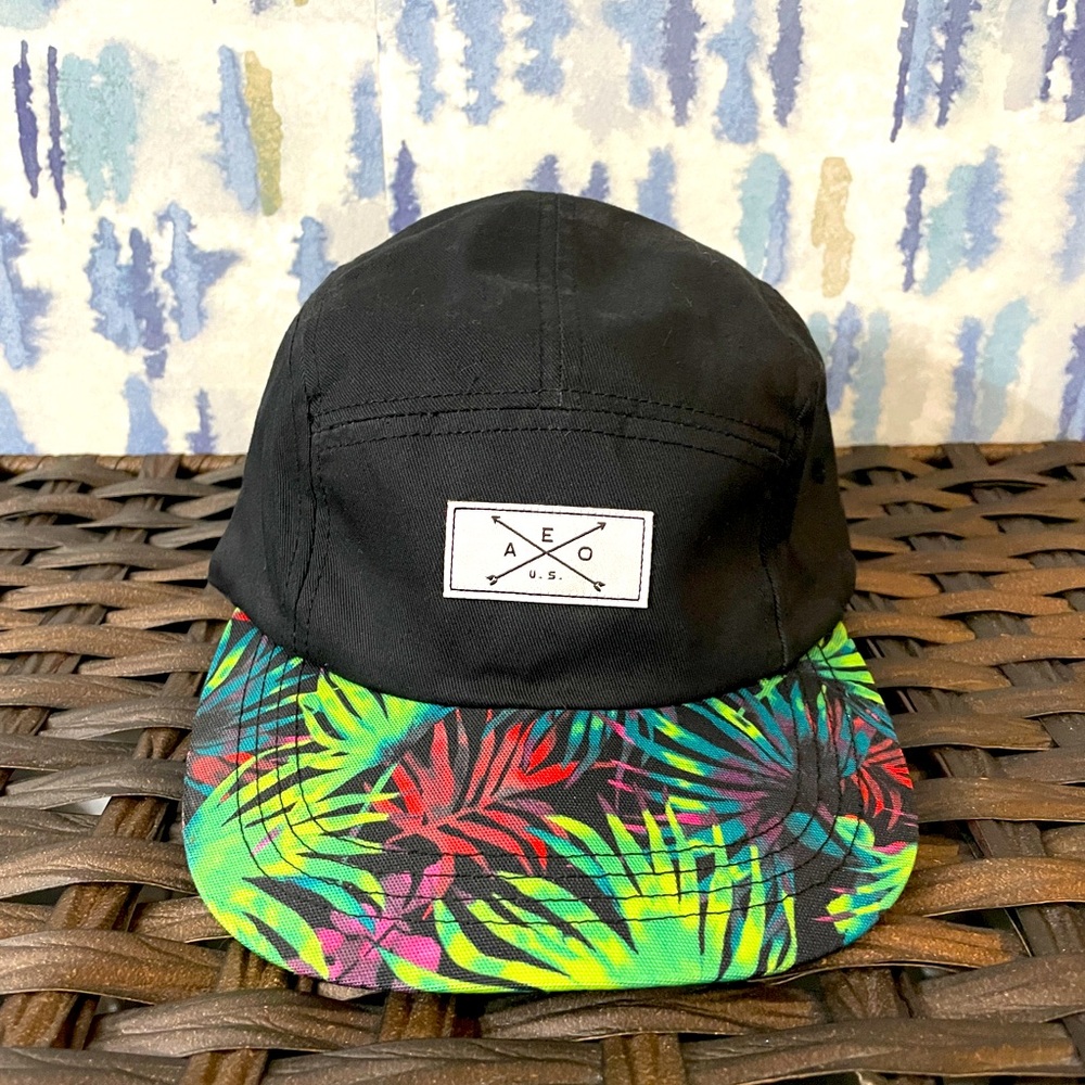 American Eagle hat/cap.  Black/Green foliage design. Excellent condition